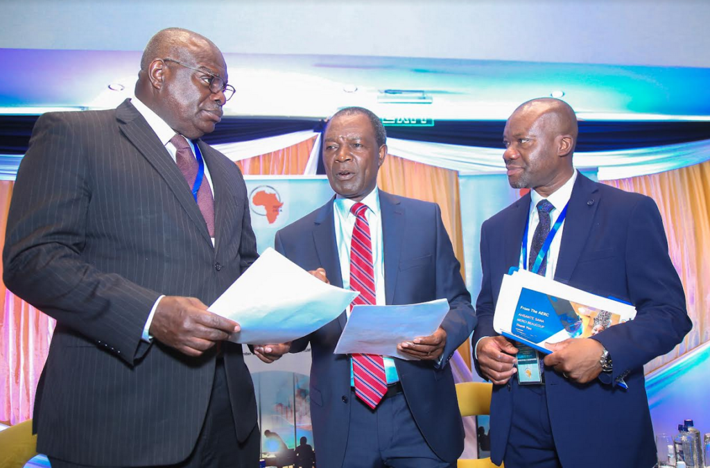 L-R: Professor Ernest Aryeetey, Chair of the Board, AERC, Hon. Professor Njuguna Ndung’u, Outgoing Executive Director, AERC and Cabinet Secretary, The National Treasury and Economic Planning, Government of Kenya and Professor Théophile Azomahou, Acting Executive Director and Director of Training, AERC sharing pleasantries during the African Economies Research Conference (AERC) 57th Biannual Research Workshop held in Nairobi.