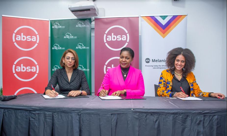 AGF's Group Director of Structured Finance Nishdeep Sethi, Absa Bank's Business Banking Director Elizabeth Wasunna and Melanin Kapital CEO Melanie Keita sign the partnership documents at Absa Offices today.