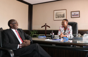 Outgoing Postbank Board Chairperson Ntoros Ole Senteu (left) handing over office to the incoming Chairperson Amb. Sarah Serem