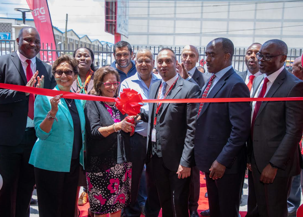 Nasim Devji DTB CEO (left front row) Rashida Alibhai Khimji DTB customer, Sameer Parmar Baba dogo Branch Manager, Linus Gitahi DTB Board Chairman and George Otiende, DTB Head of Retail Banking during the official opening of the DTB Babadogo branch in Nairobi.