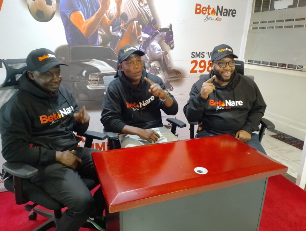 From left: Boxing coach Julius Odiambo, Daniel Wanyonyi and Betnare's Terrence Mutongerwa after Wanyonyi signed a sponsorship deal with the company. [Photo/ Courtesy]