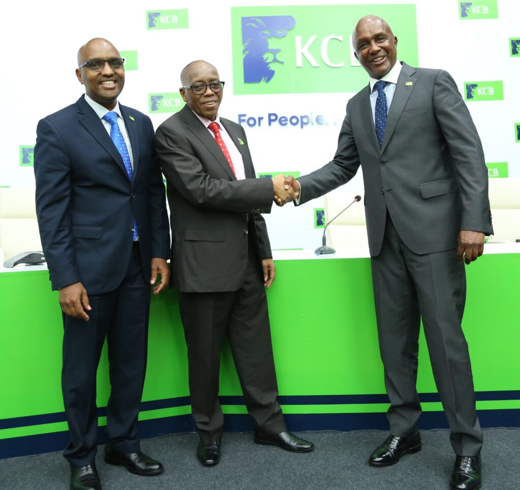 From Left: KCB Group CEO, Paul Russo, incoming KCB Group Chairman, FCS Dr. Joseph Kinyua, EGH (Centre) , and the immediate former KCB Group Chairman, Andrew Wambari Kairu (Right) during the bank's 52nd AGM. Mr.Wambari retired from the Board after serving his full term.