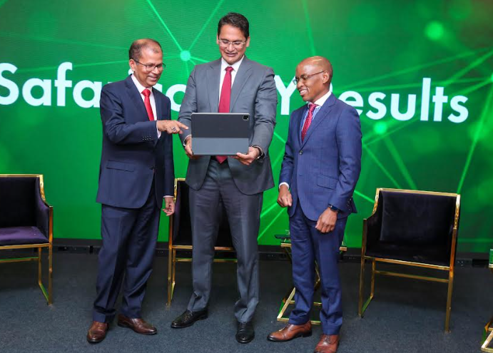 Safaricom PLC Chairman, Adil Khawaja (centre) with Safaricom PLC Chief Executive Officer (CEO), Peter Ndegwa and Safaricom PLC Chief Finance Officer, Dilip Pal, during the 2022- 2023 Financial Year Results announcement at MJC.