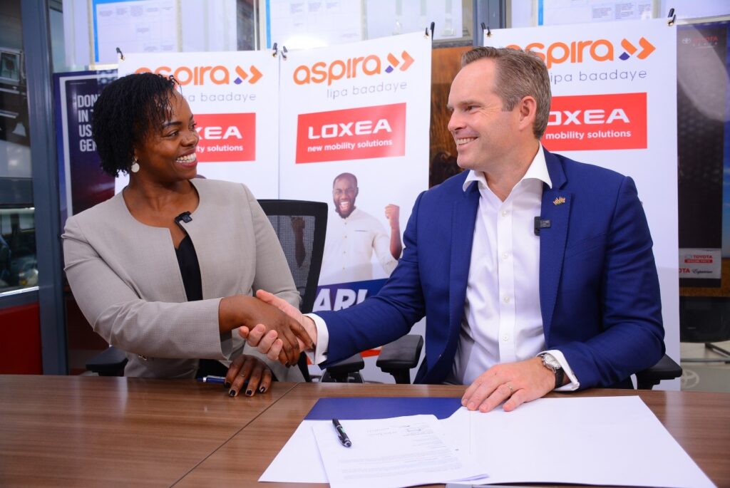 Loxea Kenya MD Jennifer Kinyoe and Cim Group CEO Mark van Beuningen after signing a financing deal to enable small and medium enterprises (SMEs) in the country to acquire new vehicles with 100 percent financing from Aspira through leasing.