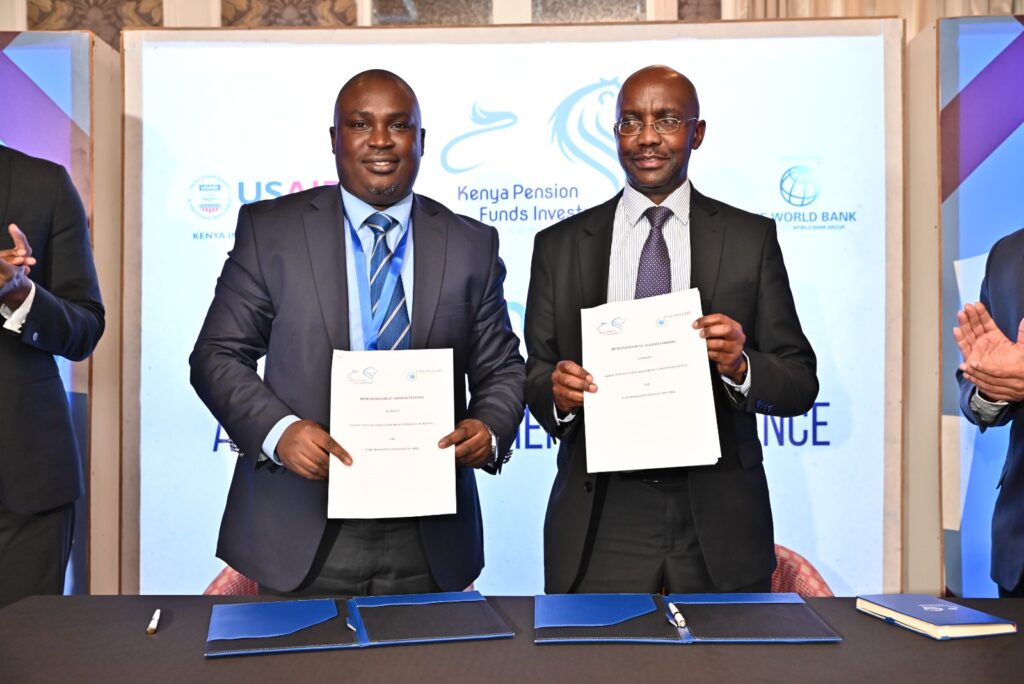 (L-R) Mr. Calvin Nyachoti, the Chairman of Kenya Pension Funds Investment Consortium (KEPFIC), and Mr. Patrick Kariuki, the Chairman Fund Managers Association (FMA), pose for a photo after signing MOU to foster local pension investments in alternative assets in Nairobi on July 21st, 2023.
