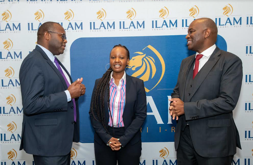 ILAM Fahari I-REIT CEO Mr Raphael Mwito (left), DYER & BLAIR Corporate Finance Director Ms Cynthia Mbaru (centre) and ILAM CEO Mr Einstein Kihanda (right) share a word during an ILAM Fahari I-REIT Redemption and Conversion media workshop at a Nairobi Hotel.