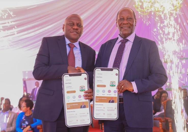From Left, Safaricom PLC Chief Corporate Security Officer Nicholas Mulila and the Governor of Kitui County Dr Julius Malombe
