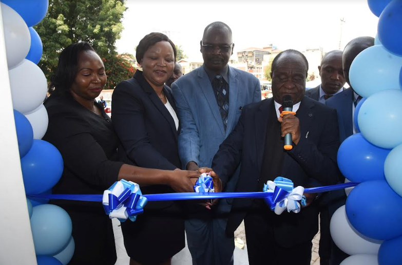 Family Bank Chief Retail Officer Phyllis Kimani, CEO Nancy Njau join the Bank’s customer Dr. Joseph Kitur & Bishop George Gichana during the official opening of the Eldoret West Branch new location at Zion mall.