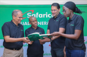 Safaricom PLC Chief Finance Officer Dilip Pal, CEO Peter Ndegwa, Chairman, Adil Arshed Khawaja and Ag Company Secretary Ms. Linda Mesa Wambani present the AGM report moments after the 16th Safaricom Annual General Meeting held at Safaricom headquarters.