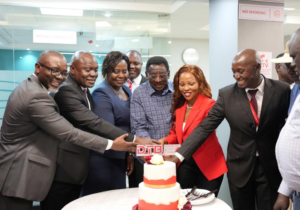 H.E James Orengo, Governor of Siaya County, leads the Diamond Trust Bank (DTB) executive team in the ribbon-cutting ceremony for the official launch of the DTB Bondo branch in Bondo, Siaya County. The DTB team was represented by George Otiende, Director of Retail Banking; Dr. Kennedy Nyakomitta, Director of Commercial Banking and Lillian Ngala, Director of Human Resources.