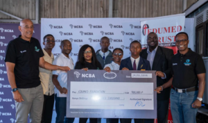 Edumed Foundation Receive a KSH 900,000 cheque from NCBA Group Chairman, Mr. James Ndegwa and NCBA Group Managing Director John Gachora during the NCBA 2025 Education Sponsorship Cheque Handover Ceremony.