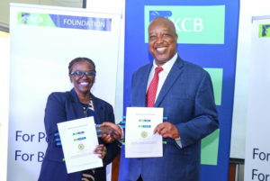 KCB Foundation Director, Mendi Njonjo and Governor Nyamira County, H.E Hon. Amos Nyaribo moments after signing a partnership agreement which seeks to technically equip the youth and create direct and indirect employment opportunities through self-employment and enterprise development.