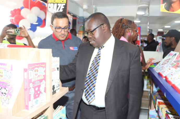 Left to Right - Sachin Varma - CEO Text Book Centre and Sylvester Metto - County Attorney, Uasin Gishu County, during the launch of the 15th Text Book Centre branch at Rupa Mall in Eldoret Town.