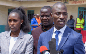 R-L: Boda Boda Association of Kenya Chairman Kevin Mubadi with Mogo Kenya Head of PR Rebecca Ngigi and Kajiado County Chairman Alex Gitari during a safety forum on theft held at Kitengela grounds.
