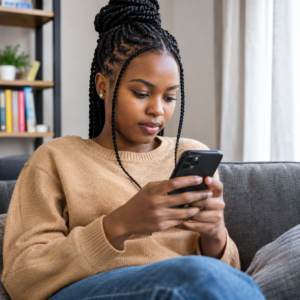 A woman focused on her phone